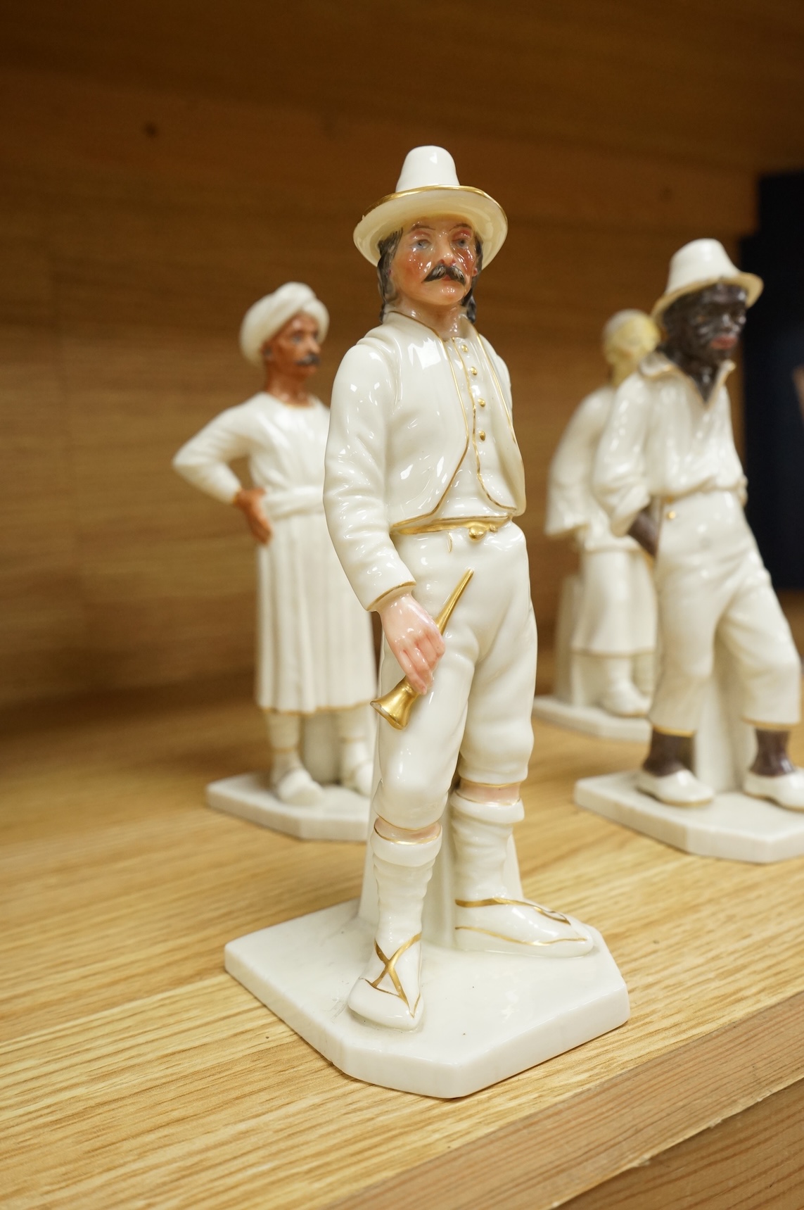 Four Royal Worcester figures from the Countries of the World Series to include Hindu and Chinaman, largest 18cm high